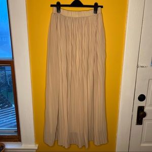 Floor length cream pleated skirt